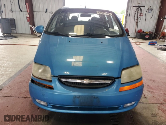 2006 Chevrolet Aveo LT with VIN KL1TG66686B652568, listed as a Copart auction lot 61491885 with 128,599 mi miles and Salvage title. Bid and sale history available at DreamBid. Image 5.