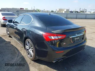 2015 Maserati Ghibli S Q4 z VIN ZAM57RTA2F1151673, wystawiony jako IAAI lot #42127872 z przebiegiem 66 701 mil mil oraz . Historia ofert i sprzedaży dostępna na DreamBid. Obrazek 3.