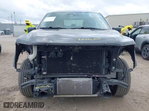 2021 Ford F-150 XL with VIN 1FTEW1CP1MKD21526, listed as a IAAI auction lot 42104907 with 76,317 mi miles and . Bid and sale history available at DreamBid. Image 13.