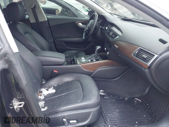 2016 Audi A7 3.0 Premium Plus with VIN WAUWGAFC0GN006470, listed as a IAAI auction lot 41638615 with 104,040 mi miles. Bid and sale history available at carsss.com. Image 5.