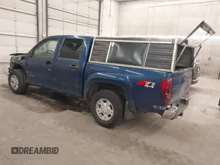 2005 Chevrolet Colorado 1SF LS Z71 with VIN 1GCDT136458138180, listed as a IAAI auction lot 41890561 with 135,653 mi miles. Bid and sale history available at carsss.com. Image 3.