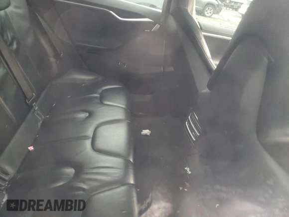 2013 Tesla Model S with VIN 5YJSA1AC9DFP10705, listed as a Copart auction lot 89394665 with Not Provided miles and Salvage Title. Bid and sale history available at carsss.com. Image 10.