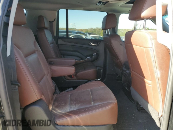 2019 Chevrolet Suburban Premier with VIN 1GNSKJKJXKR323704, listed as a Copart auction lot 72757214 with 150,404 mi miles and Salvage Title. Bid and sale history available at DreamBid. Image 11.