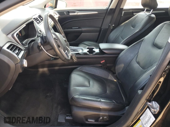 2016 Ford Fusion Titanium z VIN 3FA6P0K98GR151640, wystawiony jako Copart lot #73254594 z przebiegiem 145 473 mil mil oraz Szkoda całkowita • Salvage title. Historia ofert i sprzedaży dostępna na DreamBid. Obrazek 7.