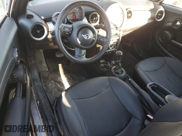 2015 MINI Convertible z VIN WMWZN3C5XFT861708, wystawiony jako Copart lot #82233054 z przebiegiem 38 498 mil mil oraz Czysty tytuł • Clean title. Historia ofert i sprzedaży dostępna na DreamBid. Obrazek 8.
