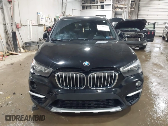 2018 BMW X1 xDrive28i with VIN WBXHT3C30J5K29383, listed as a IAAI auction lot 41503314 with 107,678 mi miles. Bid and sale history available at carsss.com. Image 12.