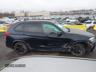 2015 BMW X5 xDrive35i z VIN 5UXKR0C59F0K65982, wystawiony jako IAAI lot #41827942 z przebiegiem 81 019 mil mil oraz . Historia ofert i sprzedaży dostępna na DreamBid. Obrazek 12.