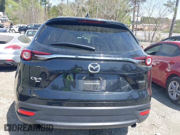 2023 Mazda CX-9 Touring Plus with VIN JM3TCBAY9P0657854, listed as a IAAI auction lot 41931409 with 54,036 mi miles and . Bid and sale history available at DreamBid. Image 16.