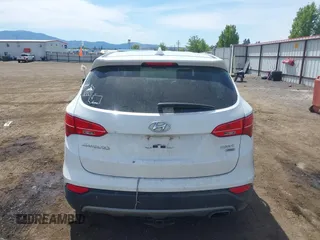 2016 Hyundai Santa Fe z VIN 5XYZTDLB9GG364375, wystawiony jako IAAI lot #42203404 z przebiegiem 143 838 mil mil oraz . Historia ofert i sprzedaży dostępna na DreamBid. Obrazek 16.