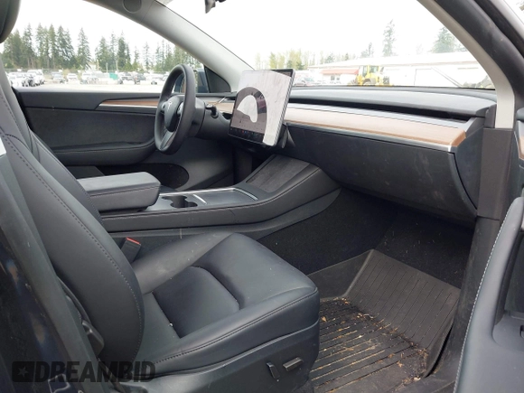 2024 Tesla Model Y Long Range with VIN 7SAYGAEE5RF981789, listed as a IAAI auction lot 41991292 with 21,103 mi miles. Bid and sale history available at carsss.com. Image 5.