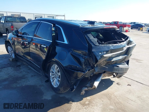 2019 Cadillac XT5 FWD with VIN 1GYKNARS7KZ117913, listed as a IAAI auction lot 41228767 with 105,335 mi miles and . Bid and sale history available at carsss.com. Image 3.