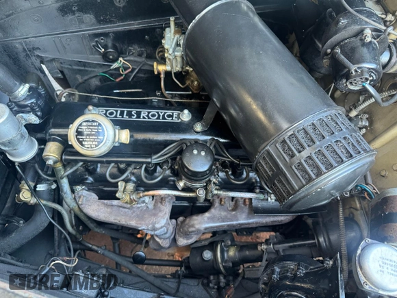 1954 Rolls-Royce Wraith z VIN LDLW7, wystawiony jako Copart lot #79949604 z przebiegiem 80 508 mil mil oraz Tytuł czysty. Historia ofert i sprzedaży dostępna na DreamBid. Obrazek 7.