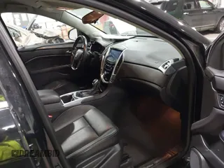 2015 Cadillac SRX with VIN 3GYFNAE36FS519604, listed as a IAAI auction lot 41215296 with 70,954 mi miles and . Bid and sale history available at DreamBid. Image 5.