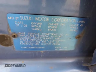 2004 Suzuki Aerio SX z VIN JS2RC61H445250748, wystawiony jako Copart lot #81488534 z przebiegiem 384 233 mil mil oraz Szkody całkowita. Historia ofert i sprzedaży dostępna na DreamBid. Obrazek 12.