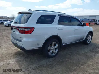 2014 Dodge Durango Limited with VIN 1C4RDJDG9EC345400, listed as a IAAI auction lot 42023709 with 145,316 mi miles. Bid and sale history available at carsss.com. Image 4.
