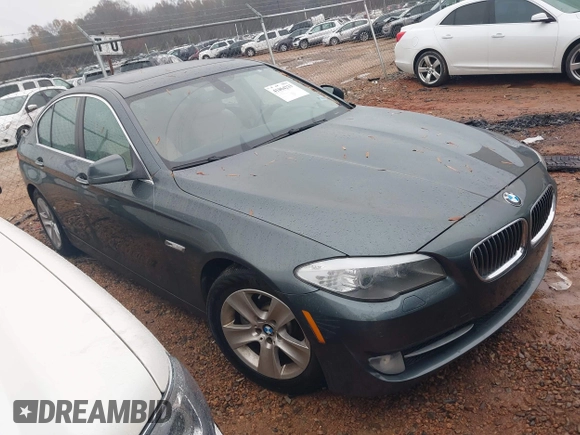 2012 BMW 5 Series 528i with VIN WBAXG5C53CDY28309, listed as a IAAI auction lot 41064233 with 129,915 mi miles. Bid and sale history available at carsss.com. Image 1.