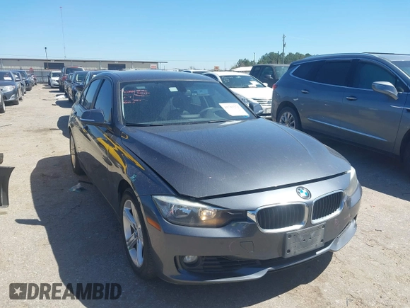 2012 BMW 3 Series 328i with VIN WBA3A5C53CFJ89806, listed as a IAAI auction lot 41703272 with 111,238 mi miles. Bid and sale history available at carsss.com. Image 1.