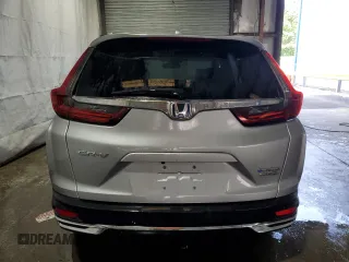2020 Honda CR-V Touring with VIN 7FART6H90LE017590, listed as a Copart auction lot 59864415 with 70,182 mi miles and Clean title. Bid and sale history available at DreamBid. Image 6.