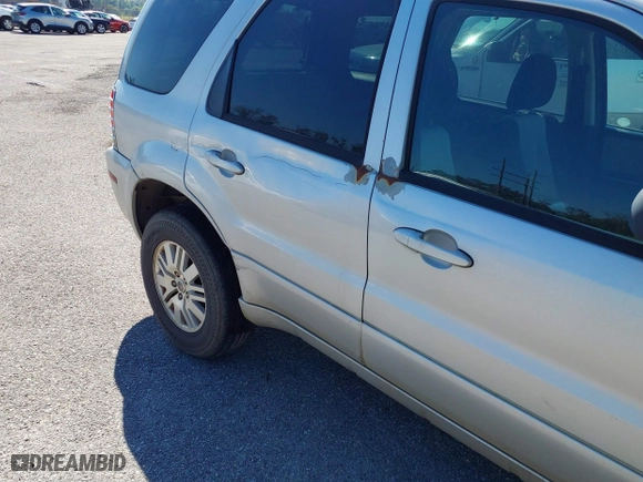 2005 Mercury Mariner Luxury with VIN 4M2YU57155DJ07235, listed as a IAAI auction lot 40687176 with 193,237 mi miles. Bid and sale history available at carsss.com. Image 6.