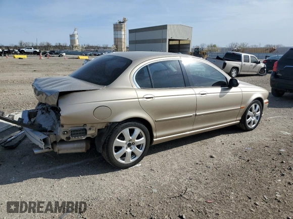 2004 Jaguar X-Type with VIN SAJEA51C64WD66013, listed as a Copart auction lot 50635615 with 47,365 mi miles and Salvage Title. Bid and sale history available at carsss.com. Image 3.