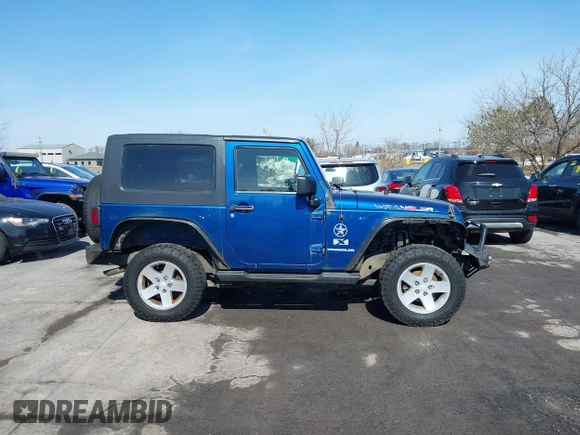 2009 Jeep Wrangler X with VIN 1J4FA24169L739367, listed as a IAAI auction lot 41810359 with 193,192 mi miles and . Bid and sale history available at carsss.com. Image 13.
