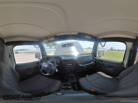 2005 Jeep Wrangler X z VIN 1J4FA39S75P321328, wystawiony jako Copart lot #59711505 z przebiegiem 126 768 mil mil oraz Szkoda całkowita • Salvage title. Historia ofert i sprzedaży dostępna na DreamBid. Obrazek 15.