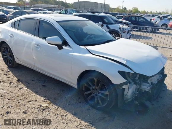 2016 Mazda Mazda6 i Grand Touring with VIN JM1GJ1W54G1456737, listed as a IAAI auction lot 41841001 with 114,870 mi miles. Bid and sale history available at carsss.com. Image 1.