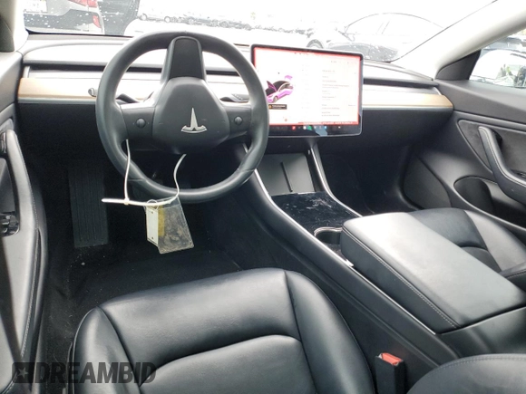 2019 Tesla Model 3 Mid Range z VIN 5YJ3E1EA3KF337854, wystawiony jako Copart lot #48472855 z przebiegiem 113 562 mil mil oraz Szkoda całkowita • Salvage title. Historia ofert i sprzedaży dostępna na DreamBid. Obrazek 8.