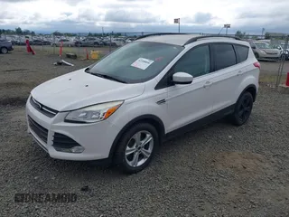 2014 Ford Escape SE with VIN 1FMCU9GX4EUB09341, listed as a IAAI auction lot 42398890 with 117,541 mi miles and . Bid and sale history available at DreamBid. Image 2.