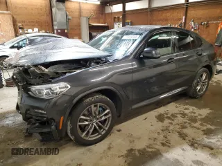 2021 BMW X4 M40i with VIN 5UX2V5C05M9H10615, listed as a Copart auction lot 71689363 with 0 mi miles. Bid and sale history available at carsss.com. Image 1.