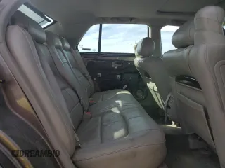 2002 Cadillac DeVille DHS z VIN 1G6KE57Y22U291523, wystawiony jako Copart lot #45711095 z przebiegiem 160 364 mil mil oraz Szkoda całkowita • Salvage title. Historia ofert i sprzedaży dostępna na DreamBid. Obrazek 10.