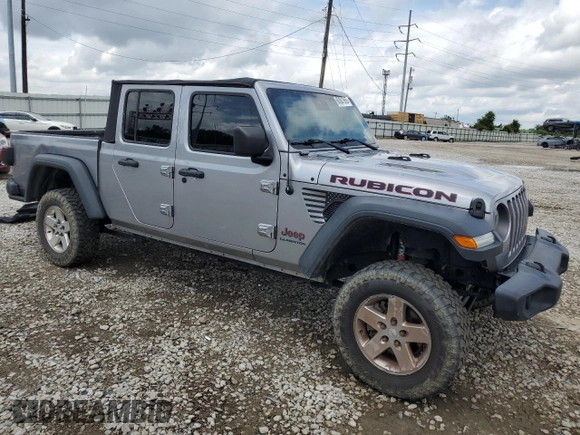 2020 Jeep Gladiator Rubicon z VIN 1C6JJTBG7LL102712, wystawiony jako Copart lot #60887965 z przebiegiem 80 262 mil mil oraz Szkoda całkowita • Salvage title. Historia ofert i sprzedaży dostępna na DreamBid. Obrazek 4.