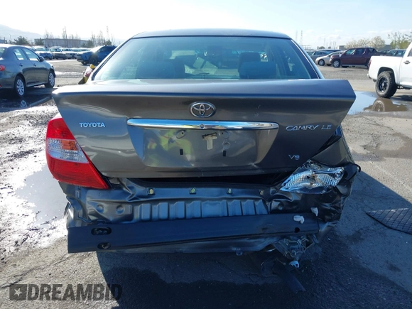 2004 Toyota Camry LE with VIN 4T1BF30K94U577260, listed as a IAAI auction lot 41906287 with 68,499 mi miles. Bid and sale history available at carsss.com. Image 17.