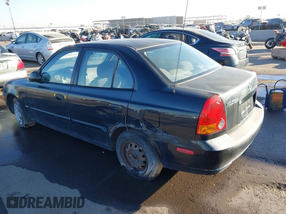 2005 Hyundai Accent GLS with VIN KMHCG45C75U632587, listed as a IAAI auction lot 40946829 with 114,666 mi miles. Bid and sale history available at carsss.com. Image 3.
