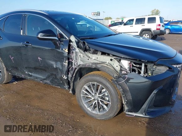 2023 Lexus NX 350h with VIN 2T2AKCEZ4PC010808, listed as a IAAI auction lot 41073898 with 30,815 mi miles and . Bid and sale history available at DreamBid. Image 6.