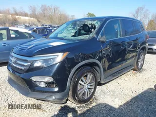 2018 Honda Pilot EX-L with VIN 5FNYF6H59JB062326, listed as a IAAI auction lot 40662881 with 77,573 mi miles and . Bid and sale history available at DreamBid. Image 2.