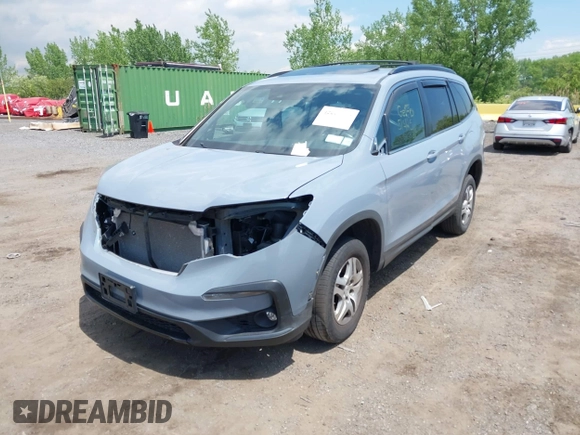 2022 Honda Pilot Special Edition with VIN 5FNYF6H27NB104990, listed as a IAAI auction lot 42219770 with 23,200 mi miles and . Bid and sale history available at DreamBid. Image 21.