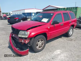 2004 Jeep Grand Cherokee Laredo with VIN 1J4GW48S24C357110, listed as a IAAI auction lot 42395691 with 160,132 mi miles and . Bid and sale history available at DreamBid. Image 2.