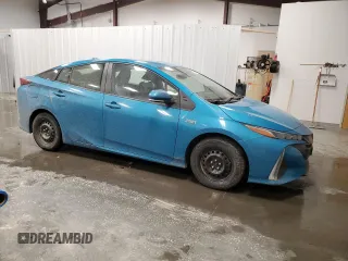 2021 Toyota Prius LE with VIN JTDKAMFP7M3186254, listed as a Copart auction lot 50225635 with 69,882 mi miles and Salvage Title. Bid and sale history available at DreamBid. Image 4.