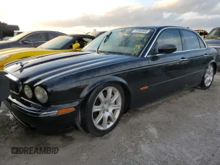 2004 Jaguar XJ with VIN SAJWA71C04SG31354, listed as a Copart auction lot 73742404 with 0 mi miles and Non Repairable. Bid and sale history available at carsss.com. Image 5.