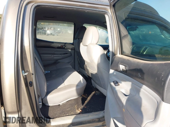 2014 Toyota Tacoma with VIN 3TMLU4EN3EM163162, listed as a IAAI auction lot 41930392 with 167,368 mi miles and . Bid and sale history available at DreamBid. Image 8.