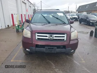 2007 Honda Pilot EX-L with VIN 2HKYF18547H533084, listed as a IAAI auction lot 41729988 with 199,886 mi miles and . Bid and sale history available at DreamBid. Image 11.