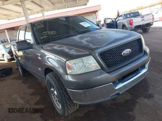 2004 Ford F-150 XLT with VIN 1FTRW12W14KD43052, listed as a IAAI auction lot 41439615 with 241,554 mi miles. Bid and sale history available at carsss.com. Image 1.
