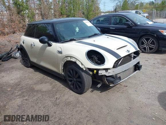 2014 MINI Hardtop S with VIN WMWXM7C55ET970769, listed as a IAAI auction lot 42181868 with 173,839 mi miles and . Bid and sale history available at DreamBid. Image 1.