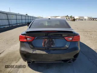 2018 Nissan Maxima SR with VIN 1N4AA6AP9JC371440, listed as a Copart auction lot 75309784 with 68,459 mi miles and Salvage Title. Bid and sale history available at carsss.com. Image 6.