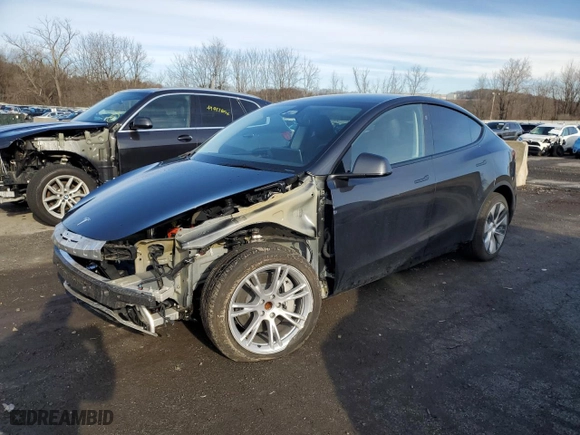 2024 Tesla Model Y with VIN 7SAYGDED1RF016792, listed as a Copart auction lot 50057345 with 6,749 mi miles and Salvage Title. Bid and sale history available at carsss.com. Image 1.