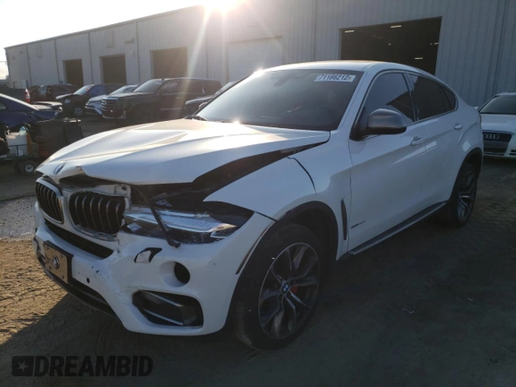 2016 BMW X6 xDrive35i with VIN 5UXKU2C57G0N81828, listed as a Copart auction lot 71186212 with 134,114 mi miles. Bid and sale history available at carsss.com. Image 1.