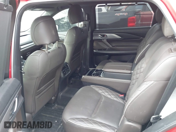 2021 Mazda CX-9 Signature with VIN JM3TCBEY0M0502938, listed as a IAAI auction lot 41734208 with 59,375 mi miles and . Bid and sale history available at carsss.com. Image 8.
