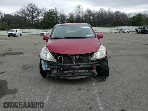 2010 Nissan Versa 1.8 S with VIN 3N1BC1AP4AL371722, listed as a Copart auction lot 72641144 with 128,445 mi miles and Salvage Title. Bid and sale history available at carsss.com. Image 11.