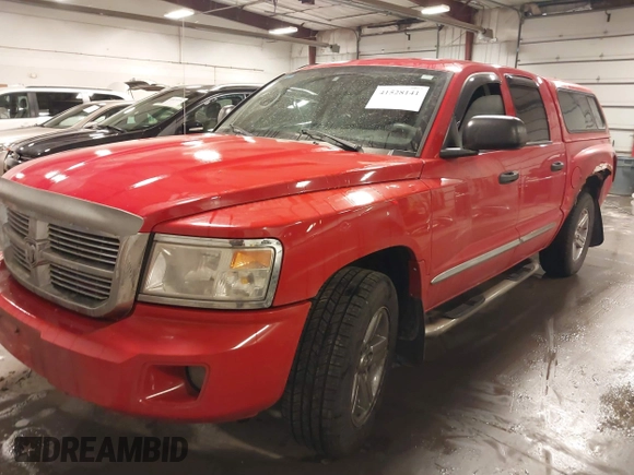 2008 Dodge Dakota Laramie z VIN 1D7HW58N58S534499, wystawiony jako IAAI lot #41528141 z przebiegiem 127 340 mil mil oraz . Historia ofert i sprzedaży dostępna na DreamBid. Obrazek 2.
